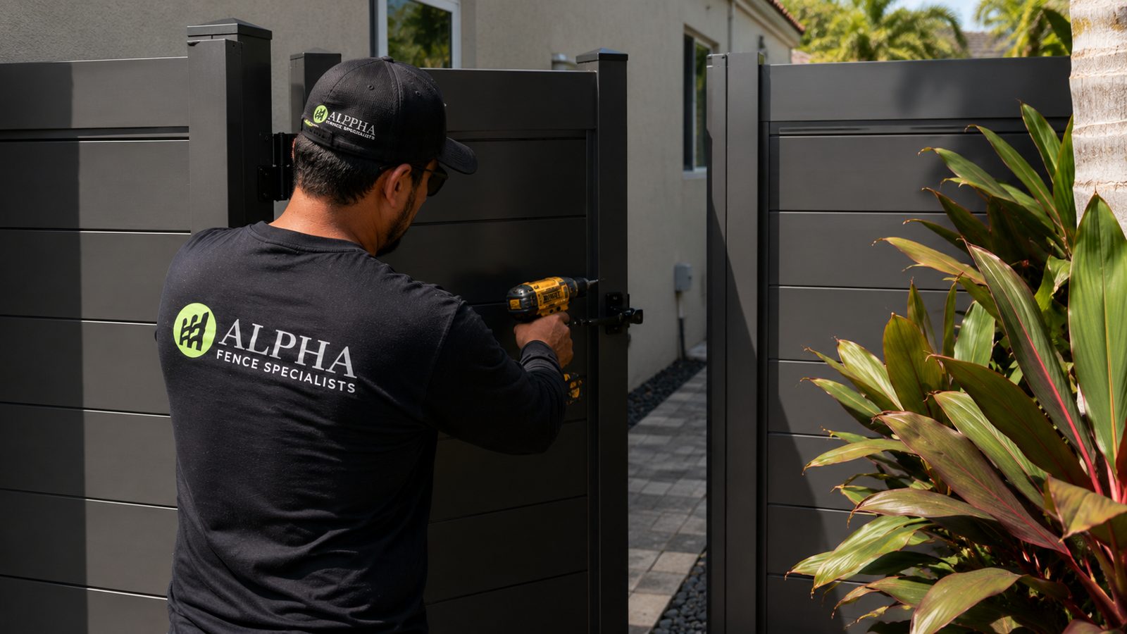 Alpha Fence Specialists crew installing pool fence in Lake Worth